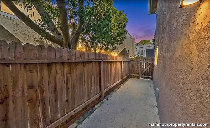 Private back patio exclusively for Unit 2 - your own outdoor retreat steps from the apartment.