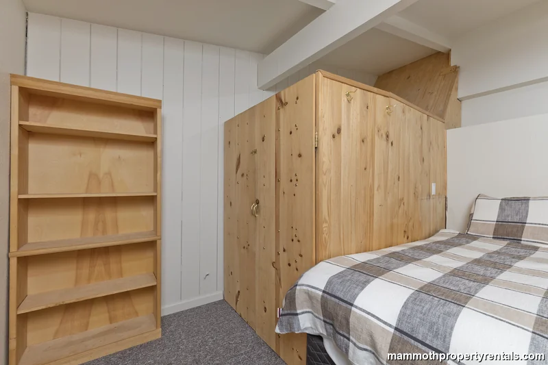 Bedroom three with queen bed