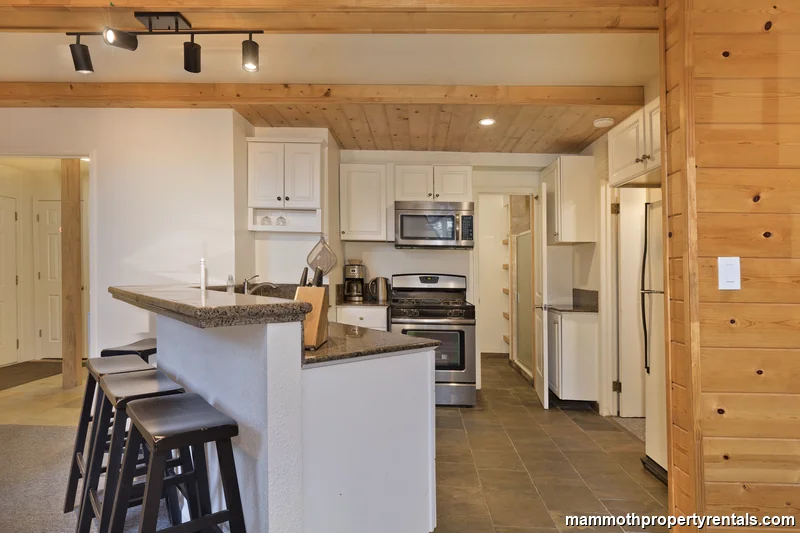 Kitchen counter with lots of seating for entertainment