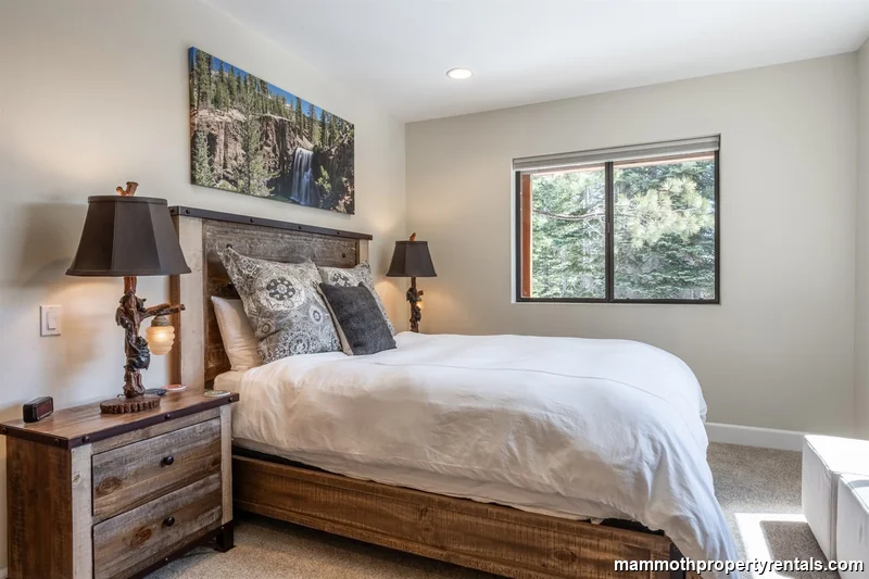 Second bedroom with a view of the outdoors